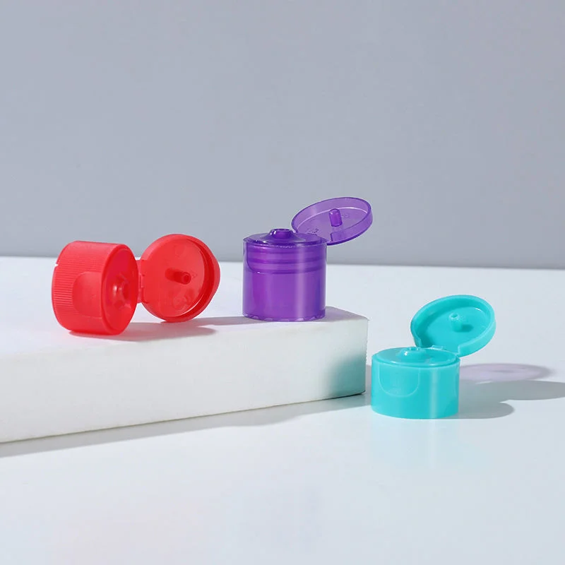 Cosmetic flip-top caps